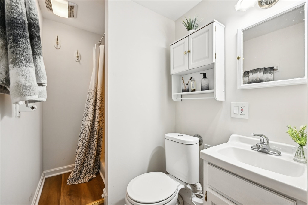 49 Dellwood Road Worcester, MA 01602 - Photo 25 of 27 a white toilet sitting next to a bathroom sink