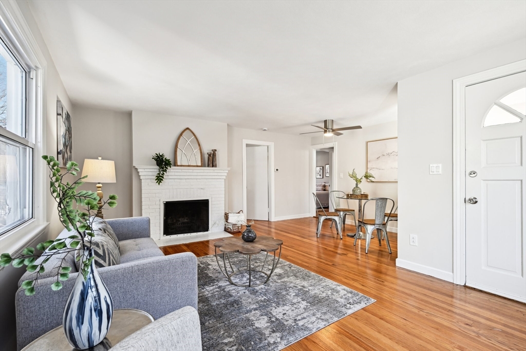 49 Dellwood Road Worcester, MA 01602 - Photo 9 of 27 a living room with furniture and a fireplace