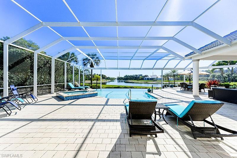 11234 5 Oaks Lane Naples, FL 34120 - Photo 21 of 34 a building outdoor space with patio furniture and garden