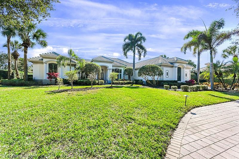 11234 5 Oaks Lane Naples, FL 34120 - Photo 34 of 34 a front view of house with yard and green space