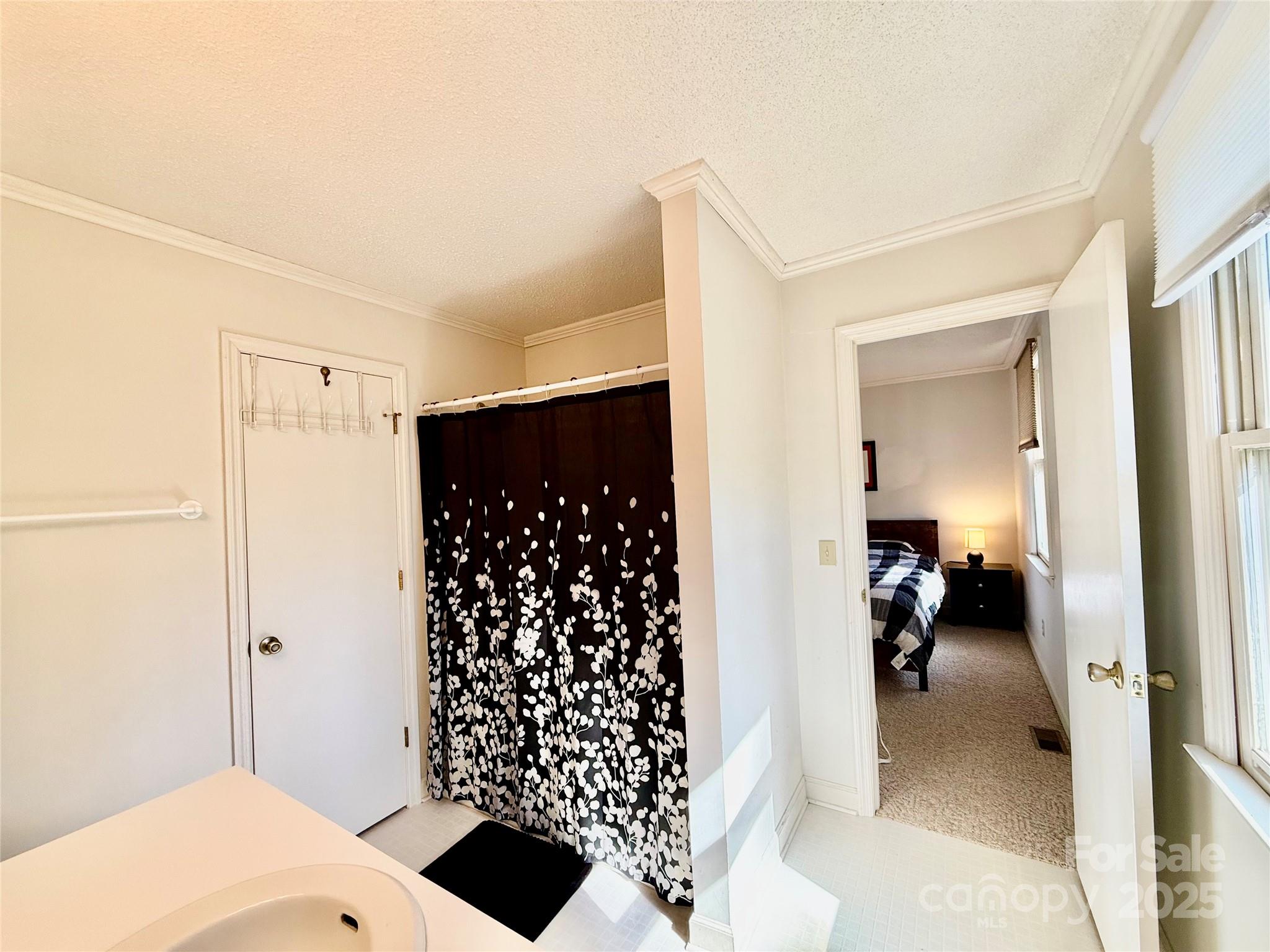 2178 Duck Cove Road Camden, SC 29020 - Photo 15 of 38 a walk in closet with wooden floor