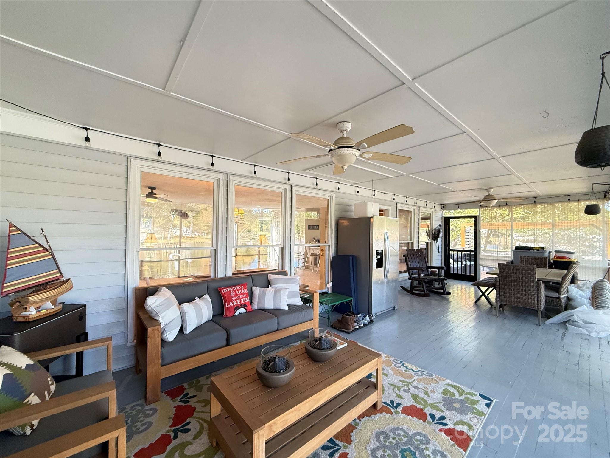 2178 Duck Cove Road Camden, SC 29020 - Photo 27 of 38 a living room with furniture and wooden floor