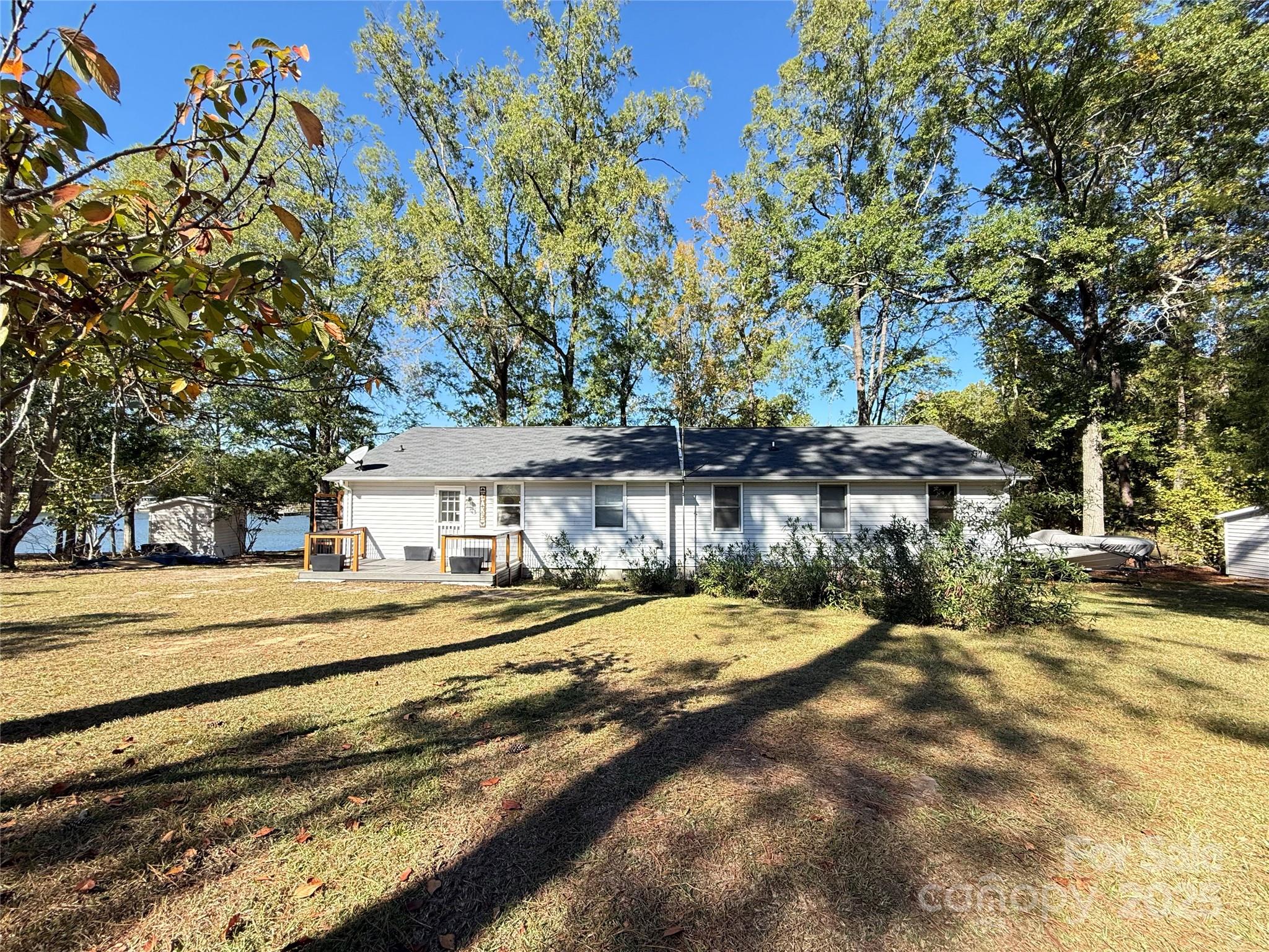 2178 Duck Cove Road Camden, SC 29020 - Photo 32 of 38 a view of a house with a big yard and large tree
