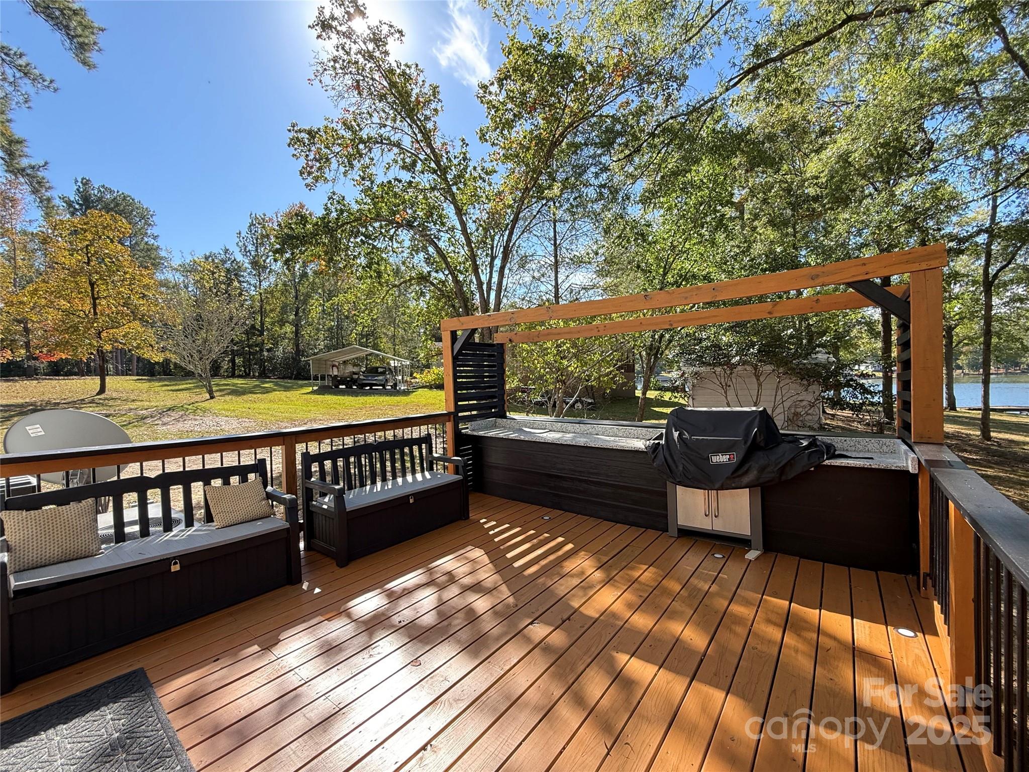 2178 Duck Cove Road Camden, SC 29020 - Photo 36 of 38 a view of balcony with wooden floor and outdoor seating
