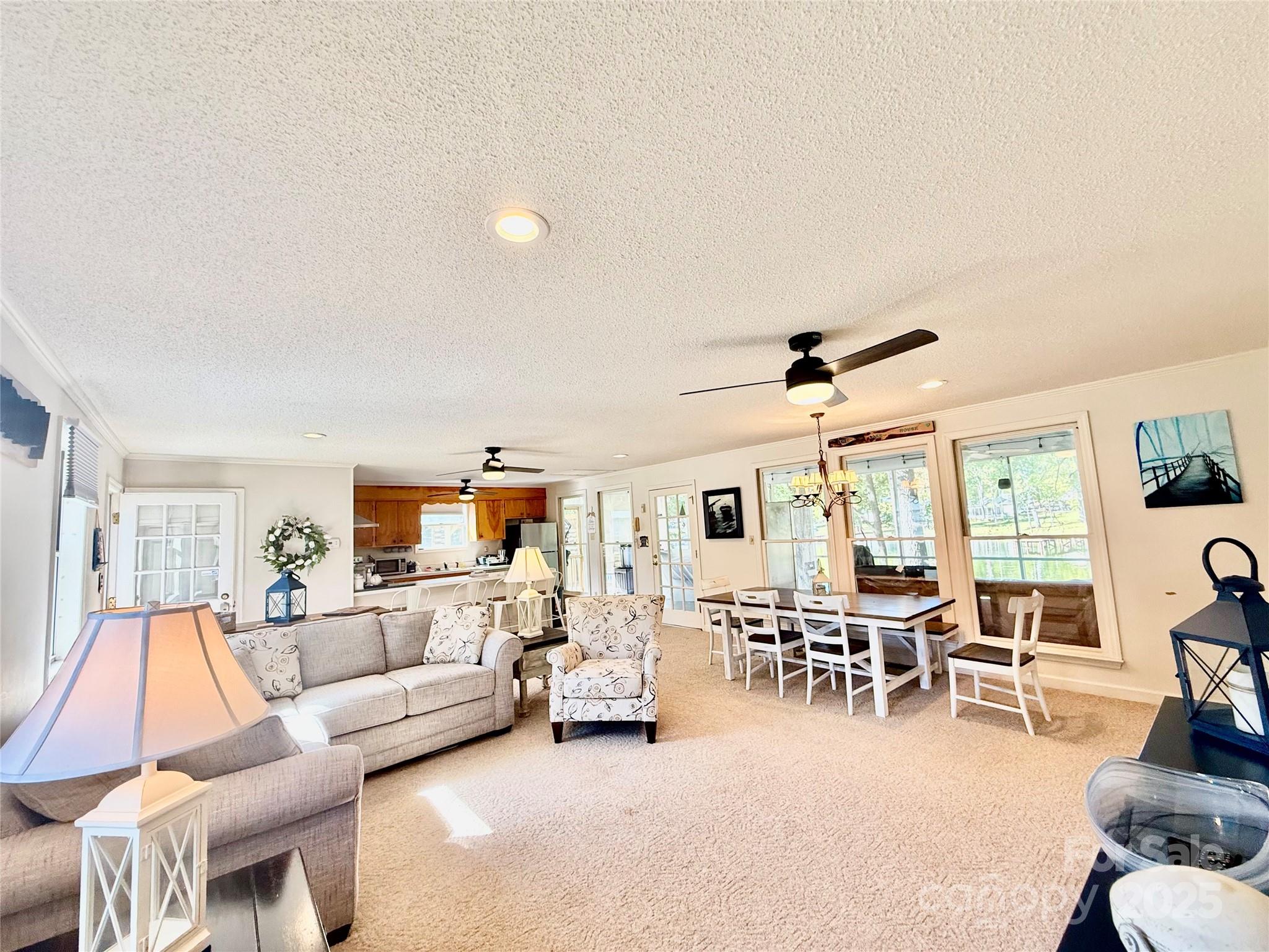 2178 Duck Cove Road Camden, SC 29020 - Photo 7 of 38 a living room with furniture and a large window