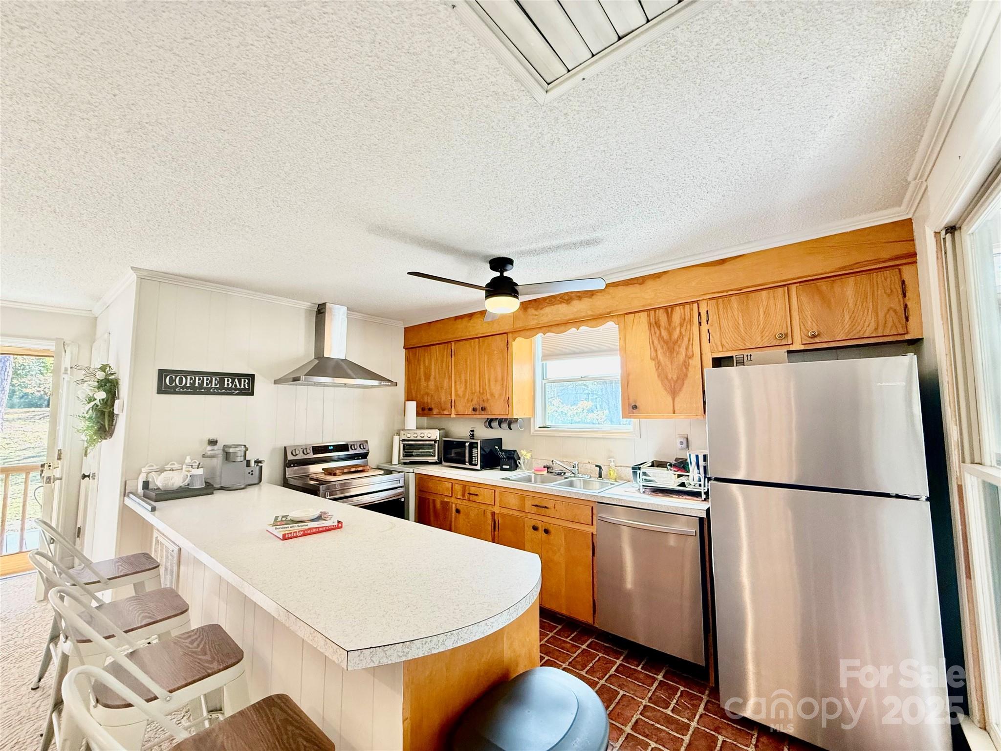 2178 Duck Cove Road Camden, SC 29020 - Photo 9 of 38 a kitchen with white cabinets and white appliances