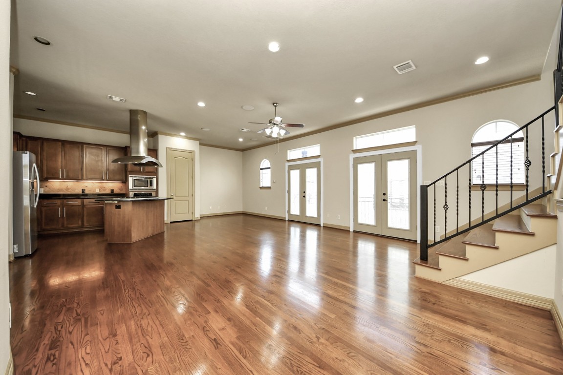 5711 Kiam Street Houston, TX 77007 - Photo 1 of 30 a view of kitchen with cabinets and wooden floor