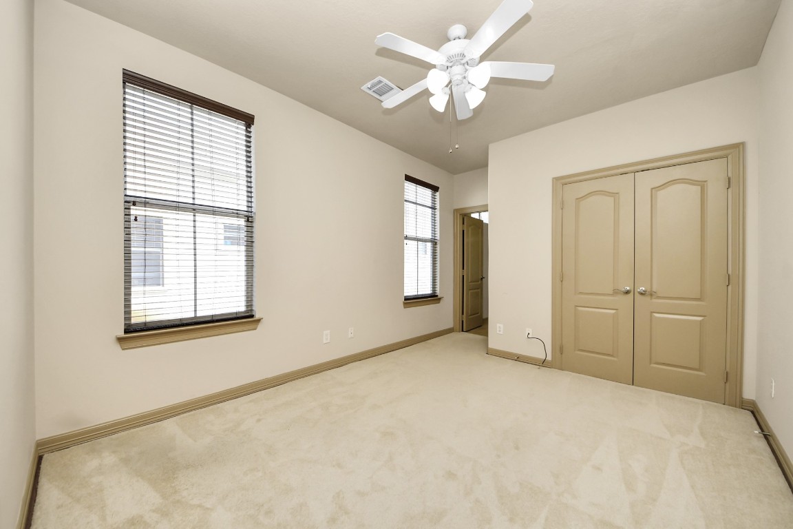 5711 Kiam Street Houston, TX 77007 - Photo 20 of 30 a view of an empty room with a window