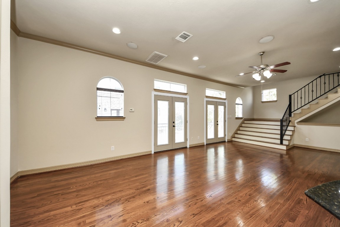 5711 Kiam Street Houston, TX 77007 - Photo 10 of 30 a view of an entryway with wooden floor