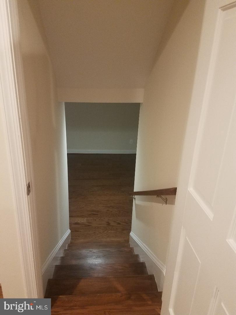 1152 Wimbledon Drive McLean, VA 22101 - Photo 17 of 37 Stairs to Rec Room & Utility Room w/ Washer& Dyer