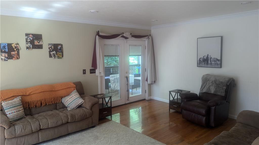 228 Reiber Road Renfrew, PA 16053 - Photo 16 of 25 a living room with furniture and a lamp