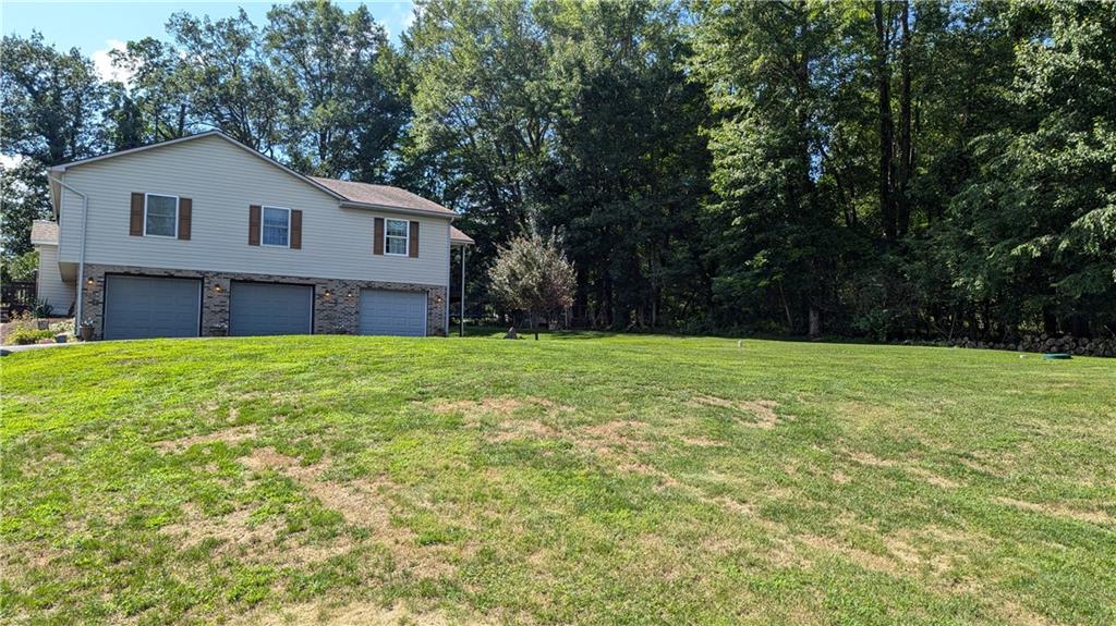 228 Reiber Road Renfrew, PA 16053 - Photo 7 of 25 a house view with a outdoor space