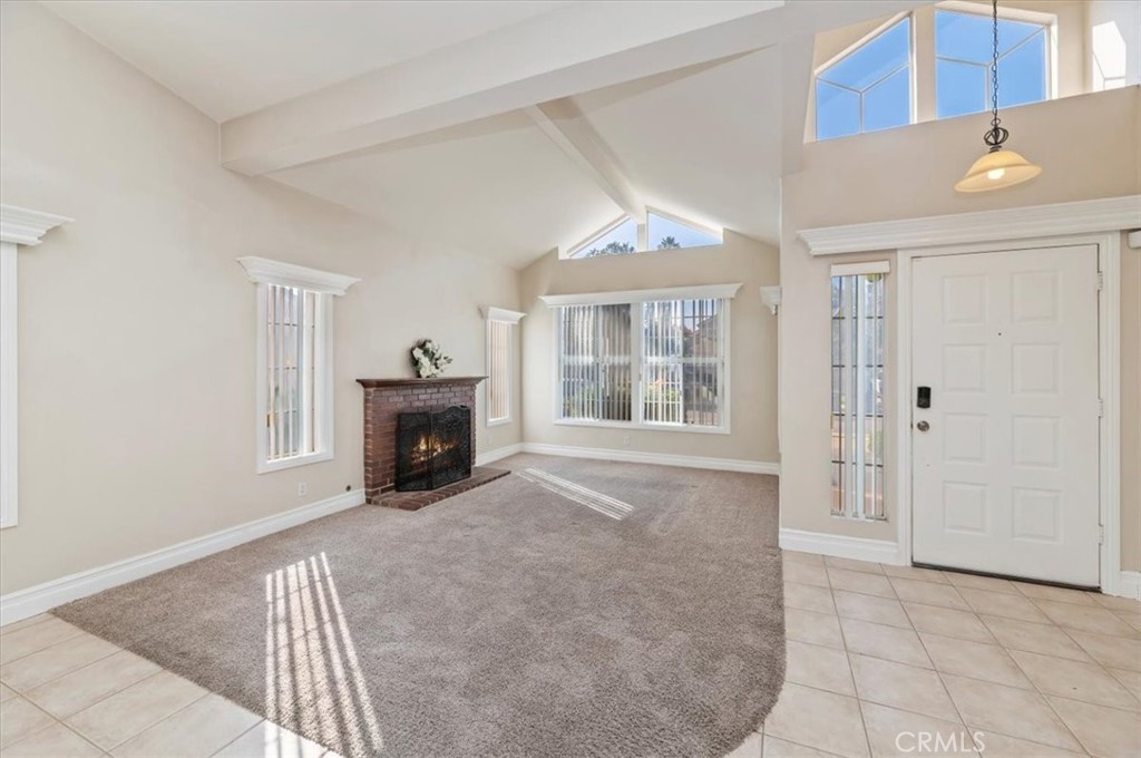 19966 Westerly Drive Riverside, CA 92508 - Photo 9 of 39 a view of an empty room with a window and fireplace