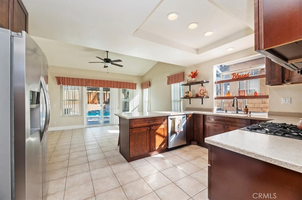 19966 Westerly Drive Riverside, CA 92508 - Photo 13 of 39 a kitchen with stainless steel appliances granite countertop a refrigerator and a stove