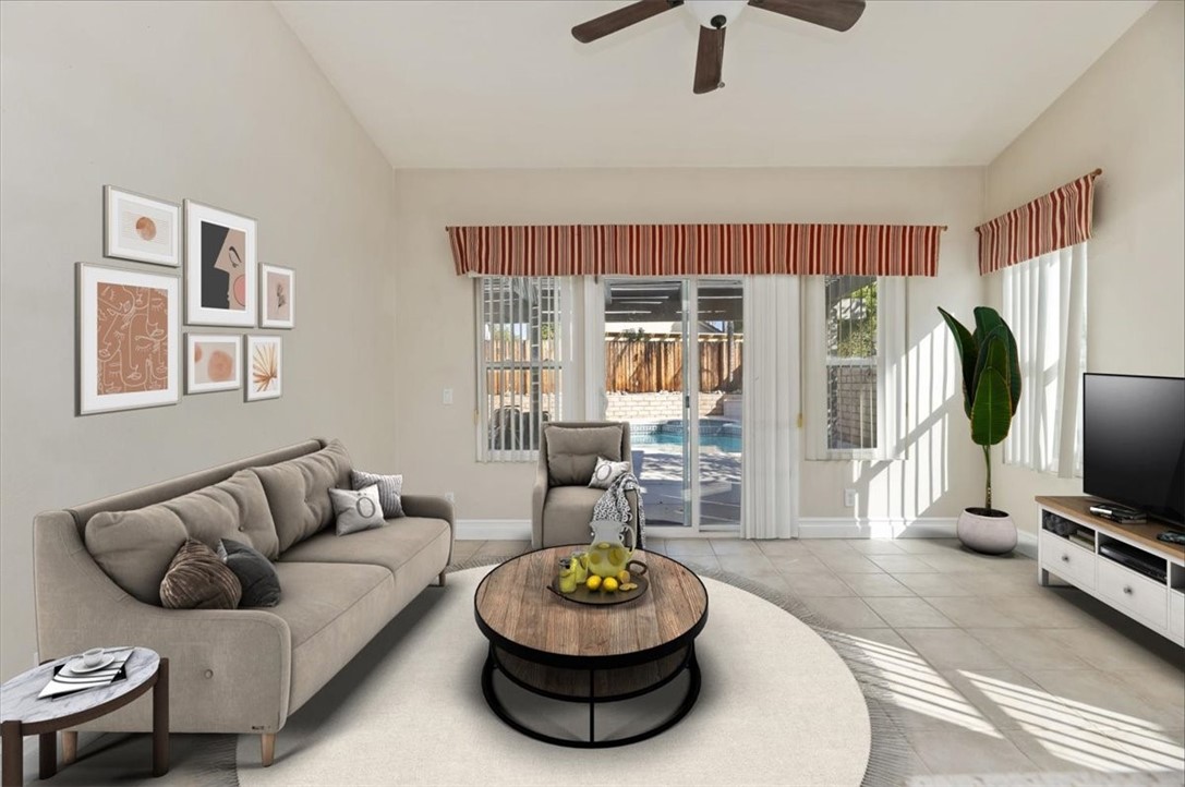 19966 Westerly Drive Riverside, CA 92508 - Photo 16 of 39 a living room with furniture and a flat screen tv