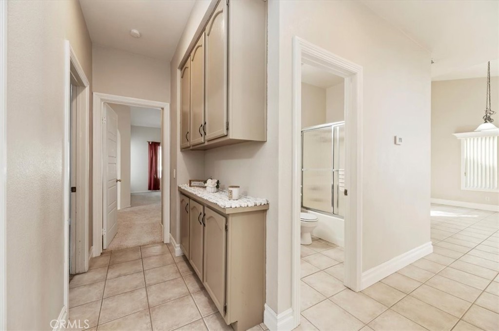 19966 Westerly Drive Riverside, CA 92508 - Photo 20 of 39 a kitchen with stainless steel appliances granite countertop a refrigerator and a sink