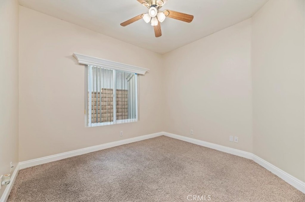 19966 Westerly Drive Riverside, CA 92508 - Photo 23 of 39 an empty room with a window