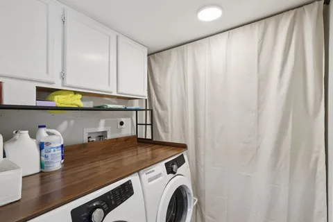 a view of kitchen with washer and dryer