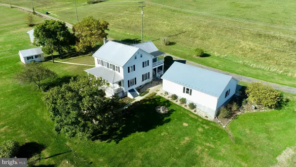 a view of an empty room with wooden walls