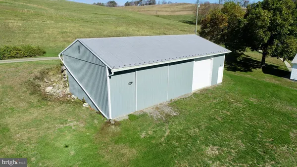 a bathroom with a bathtub and window