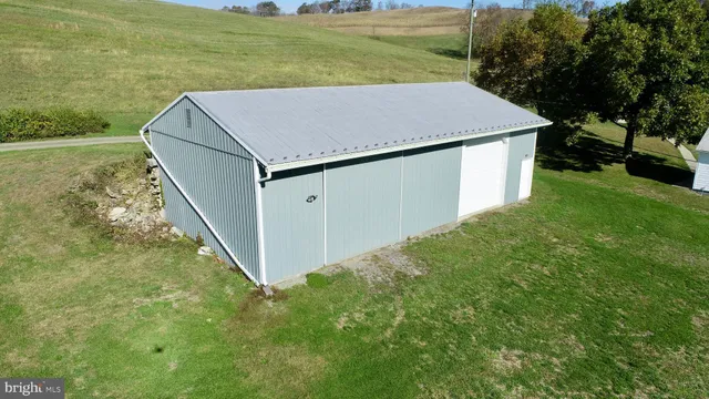 a bathroom with a bathtub and window