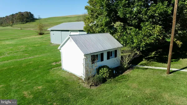 a kitchen with stainless steel appliances granite countertop a sink stove and microwave