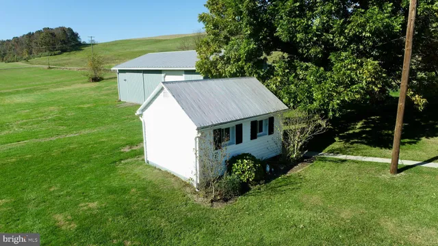 a kitchen with stainless steel appliances granite countertop a sink stove and microwave