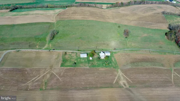 a view of storage and utility room with a window