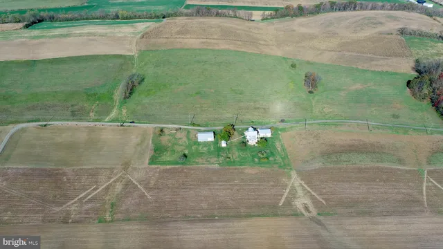 a view of storage and utility room with a window