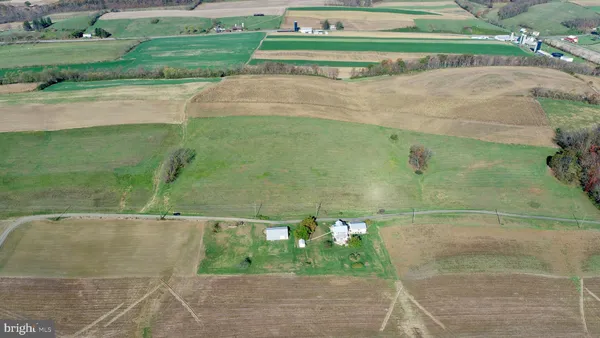 a bathroom with a sink a toilet and tub