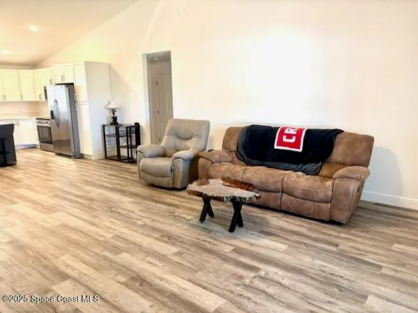 a living room with furniture and a couch