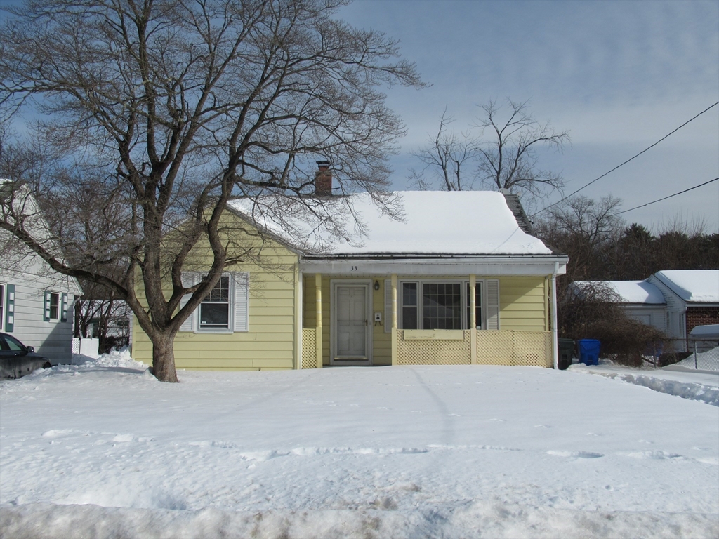 33 Connolly Street Springfield, MA 01151 - Photo 13 of 15 a view of a house with a yard and garage