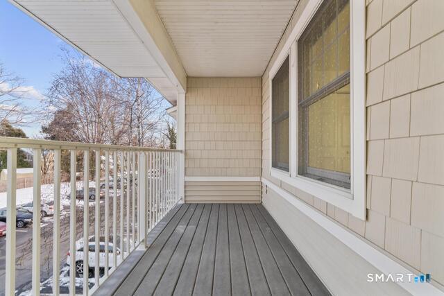 468 Main Street, Unit 318 East Lyme, CT 06357 - Photo 25 of 33 a view of wooden balcony