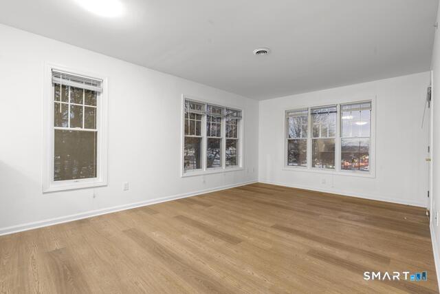468 Main Street, Unit 318 East Lyme, CT 06357 - Photo 29 of 33 a view of an empty room with a window