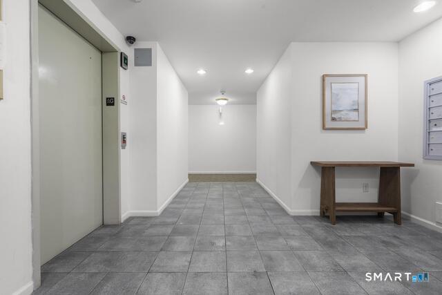 468 Main Street, Unit 318 East Lyme, CT 06357 - Photo 32 of 33 a view of a hallway with entryway