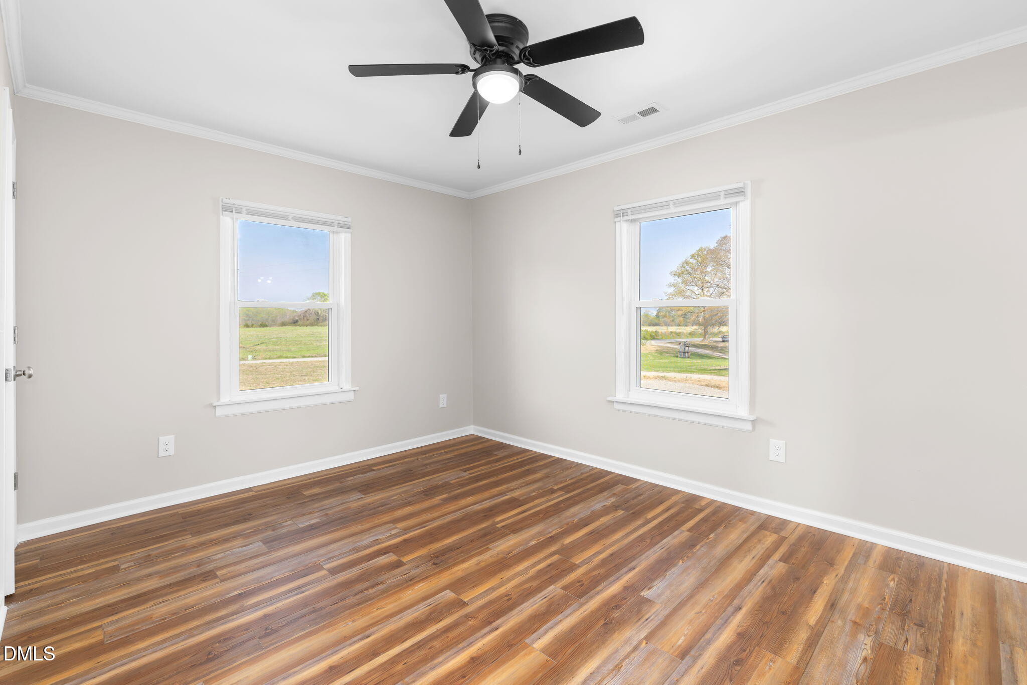 426 Rooker Dairy Road Norlina, NC 27563 - Photo 12 of 33 a view of a room with a ceiling fan and a window