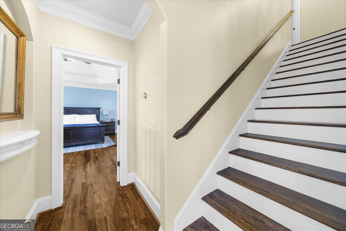 39 Fieldstone Drive Northeast Rome, GA 30161 - Photo 26 of 56 a view of a hallway with wooden floor and staircase