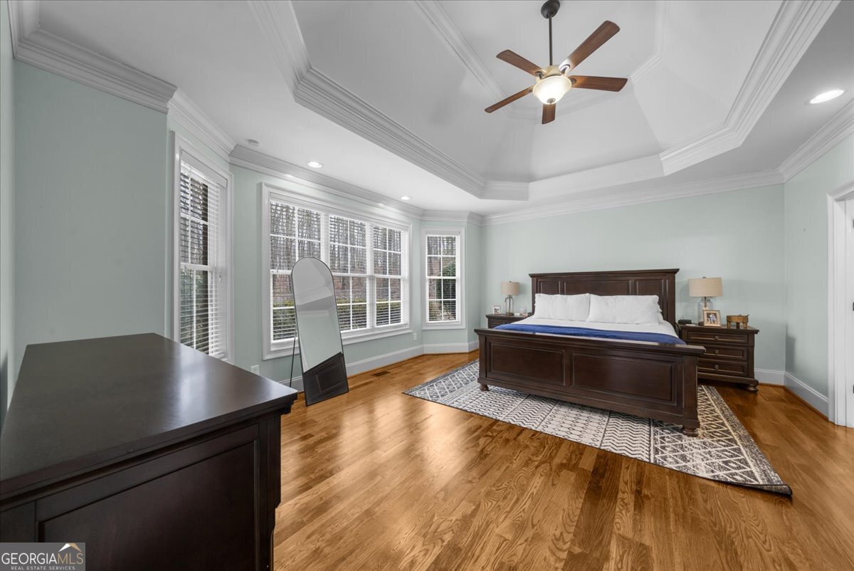 39 Fieldstone Drive Northeast Rome, GA 30161 - Photo 28 of 56 a spacious bedroom with a bed and a large window