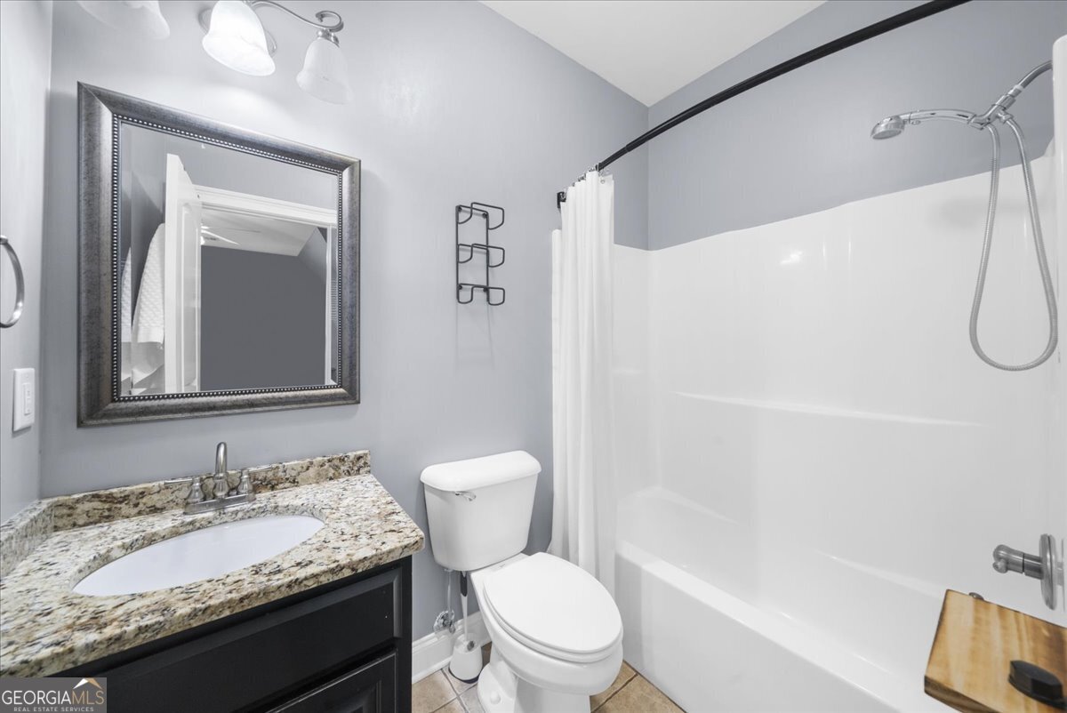 39 Fieldstone Drive Northeast Rome, GA 30161 - Photo 46 of 56 a bathroom with a granite countertop sink toilet and shower