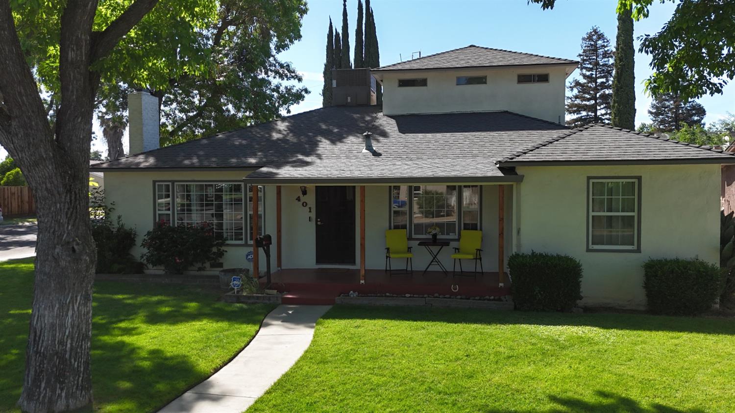 401 Fortuna Avenue Modesto, CA 95354 - Photo 32 of 43 a front view of a house with a yard and porch