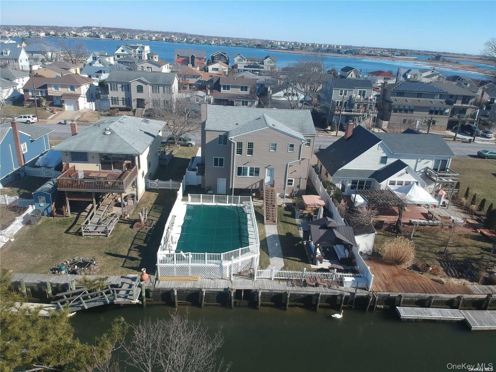 3434 Colony Drive Baldwin, NY 11510 - Photo 16 of 21 a view of a lake in middle of the town
