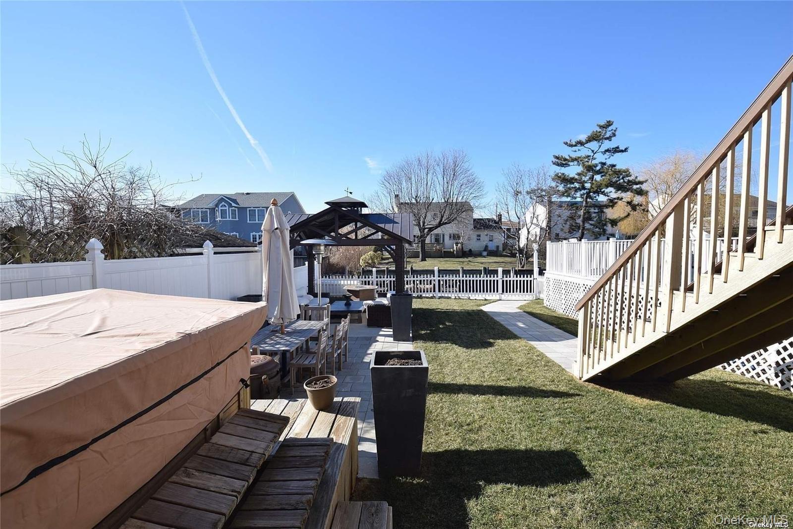 3434 Colony Drive Baldwin, NY 11510 - Photo 2 of 21 a view of a balcony with chairs
