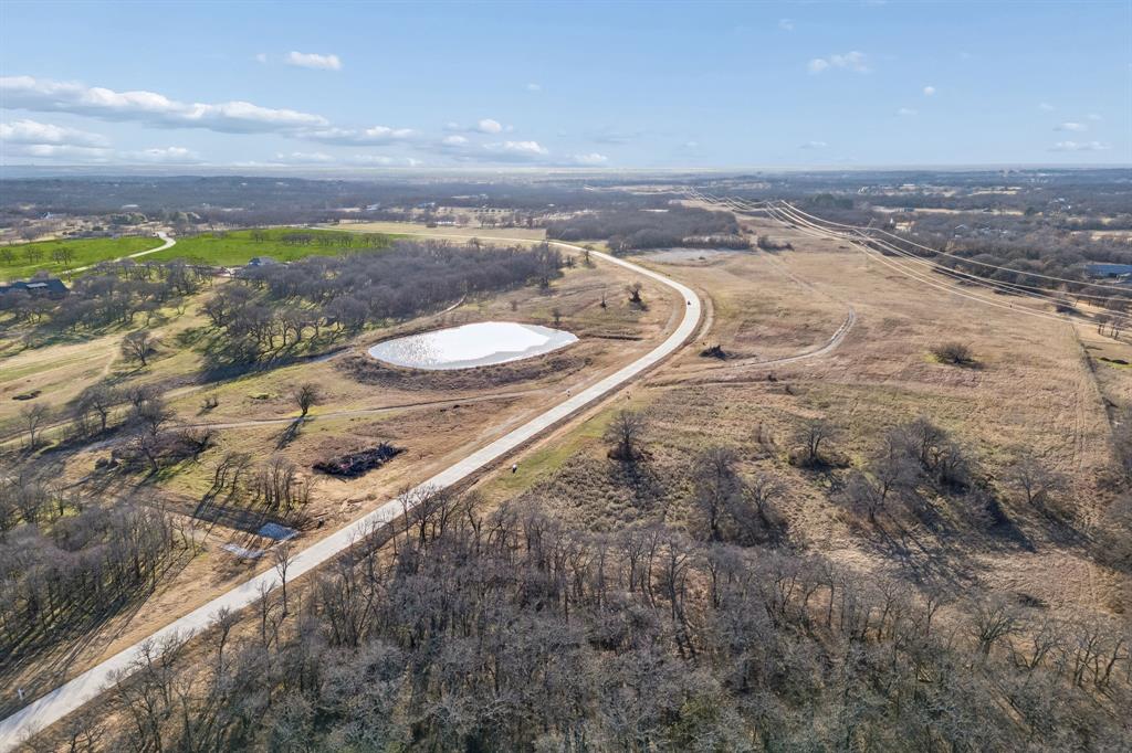 600 Wiesen Way Argyle, TX 76226 - Photo 14 of 40 a view of a dry yard with wooden fence