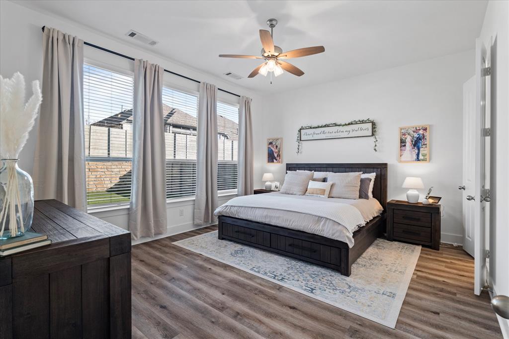 1332 Thompson Road Argyle, TX 76226 - Photo 13 of 36 Bedroom with dark wood-type flooring and ceiling fan
