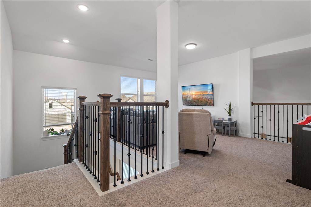 1332 Thompson Road Argyle, TX 76226 - Photo 26 of 36 Hallway featuring carpet, an upstairs landing, and recessed lighting