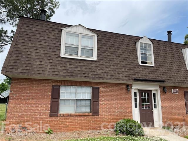 5805 Hunting Ridge Lane, Unit A Charlotte, NC 28212 - Photo 1 of 4 a front view of a house
