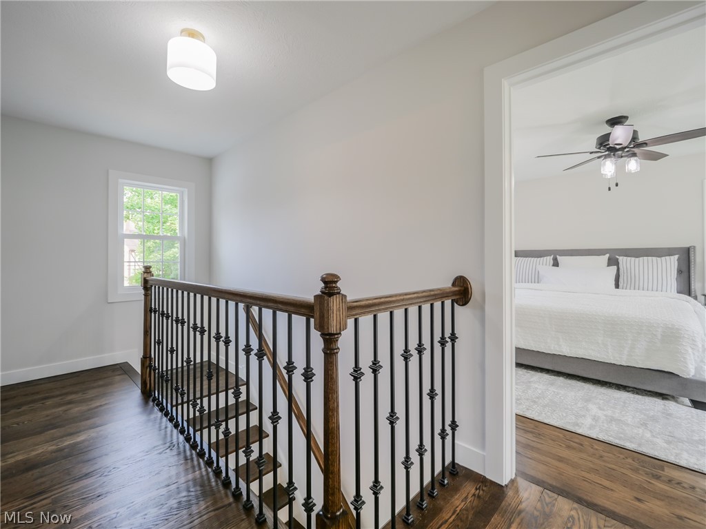 14160 Onaway Road Cleveland, OH 44120 - Photo 14 of 35 Staircase with dark wood-type flooring and ceiling fan