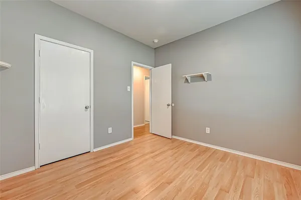 wooden floor and window in a room