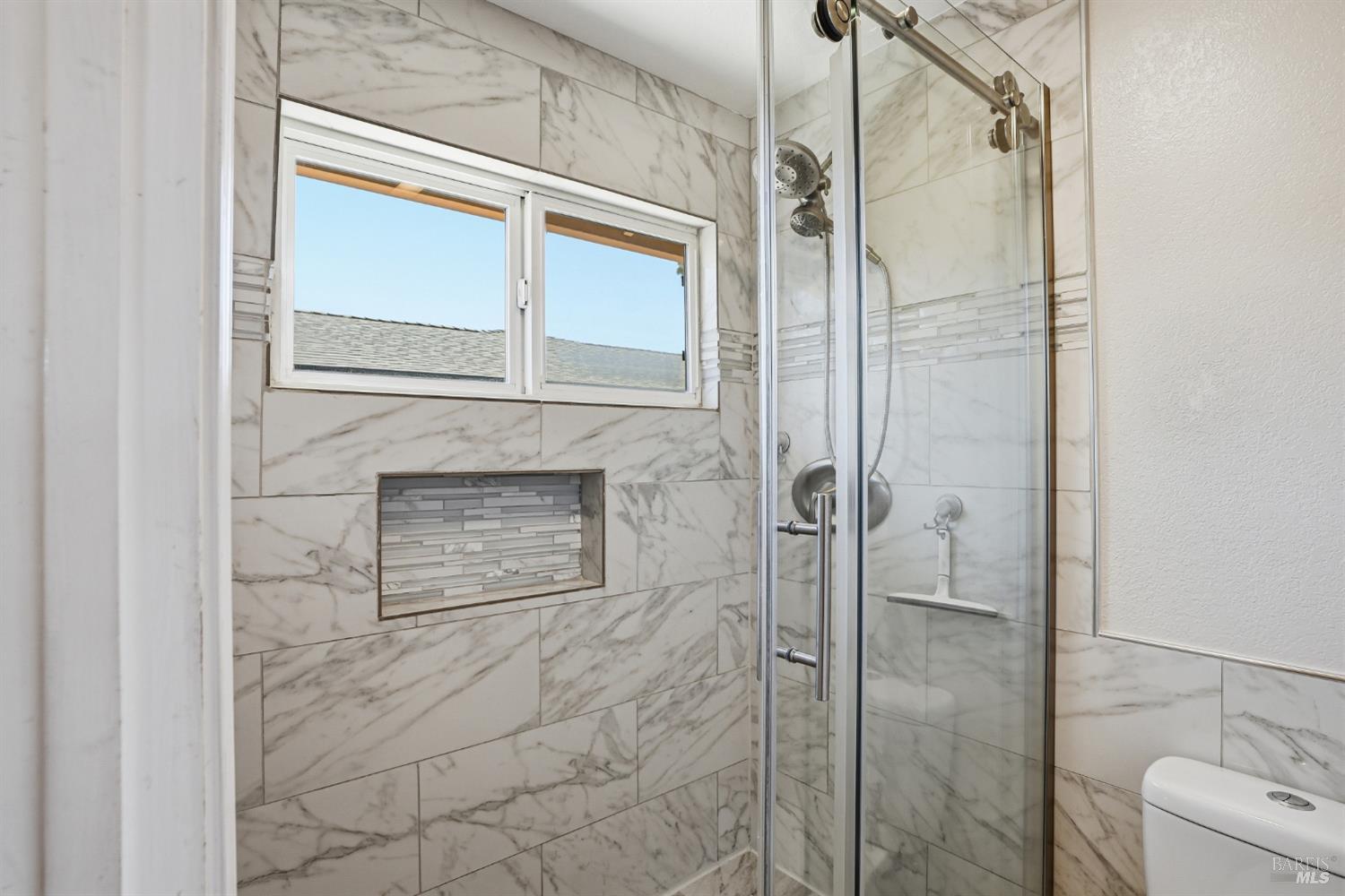 773 Blue Ridge Lane Vacaville, CA 95688 - Photo 32 of 44 a bathroom with a shower and a mirror