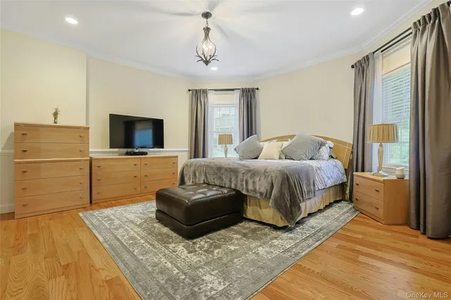 a bathroom with a granite countertop sink and a bathtub